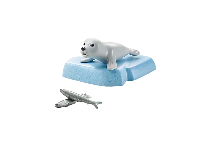 Wiltopia Seal toy figure on blue float with two fish accessories, part of an eco-friendly interactive kids’ playset.