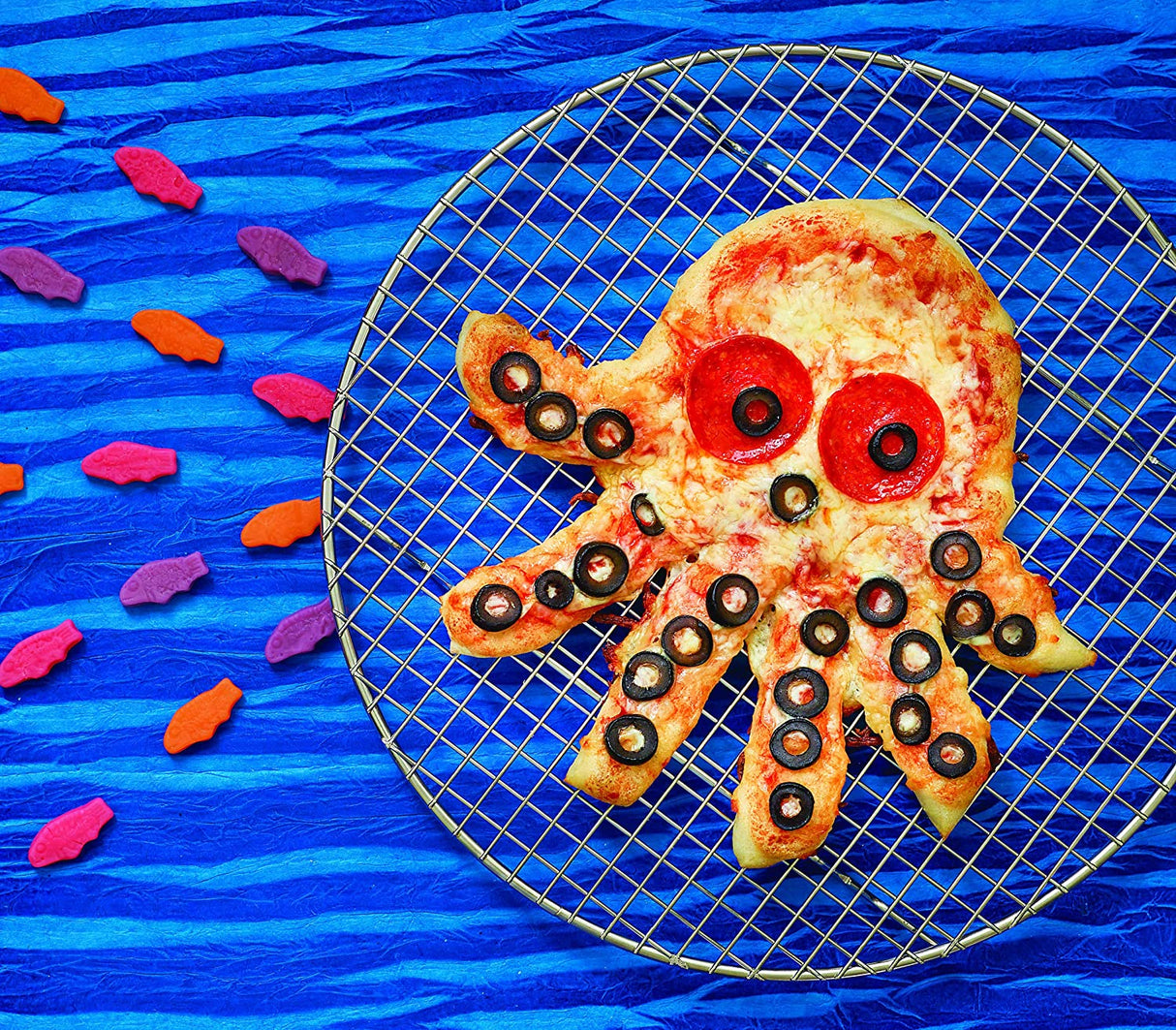 Kids Magical Baking octopus-shaped pizza with pepperoni and olives on a wire rack over blue background.