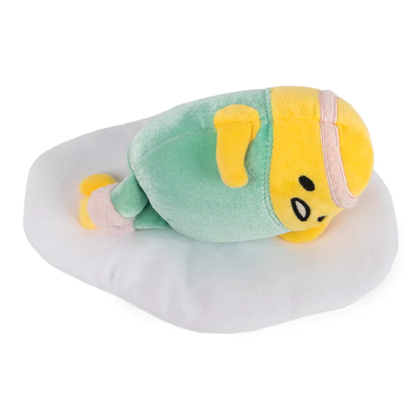 Gudetama Eggercise plush showing lazy egg in teal workout outfit and pink sweatbands on soft white egg base.