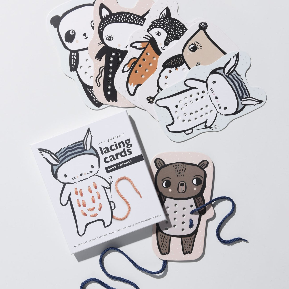 Baby Animal Lacing Cards featuring hand illustrated baby animals with lacing holes for motor skill development.