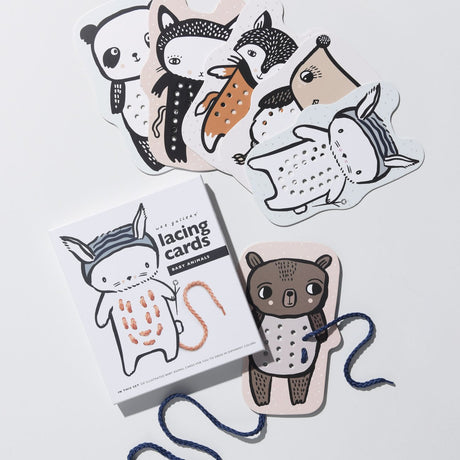 Baby Animal Lacing Cards featuring hand illustrated baby animals with lacing holes for motor skill development.