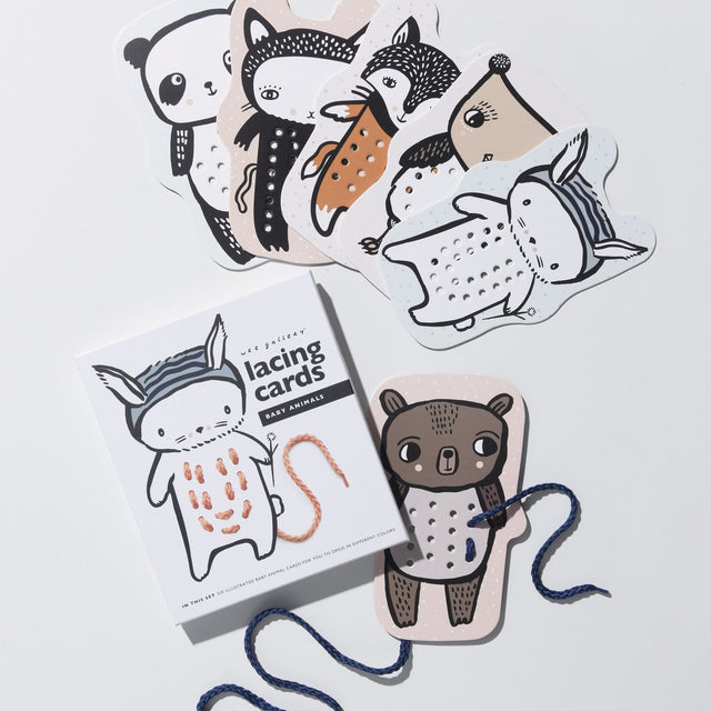 Baby Animal Lacing Cards featuring hand illustrated baby animals with lacing holes for motor skill development.