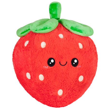 Strawberry plush toy with a smiling face, green leaves, and soft red body measuring 15 squishy inches for kids 3 and up.