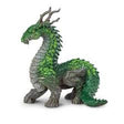 Jungle Dragon figure with leaf-like green scales, tree trunk legs, and branch-like horns, standing 5 inches tall.