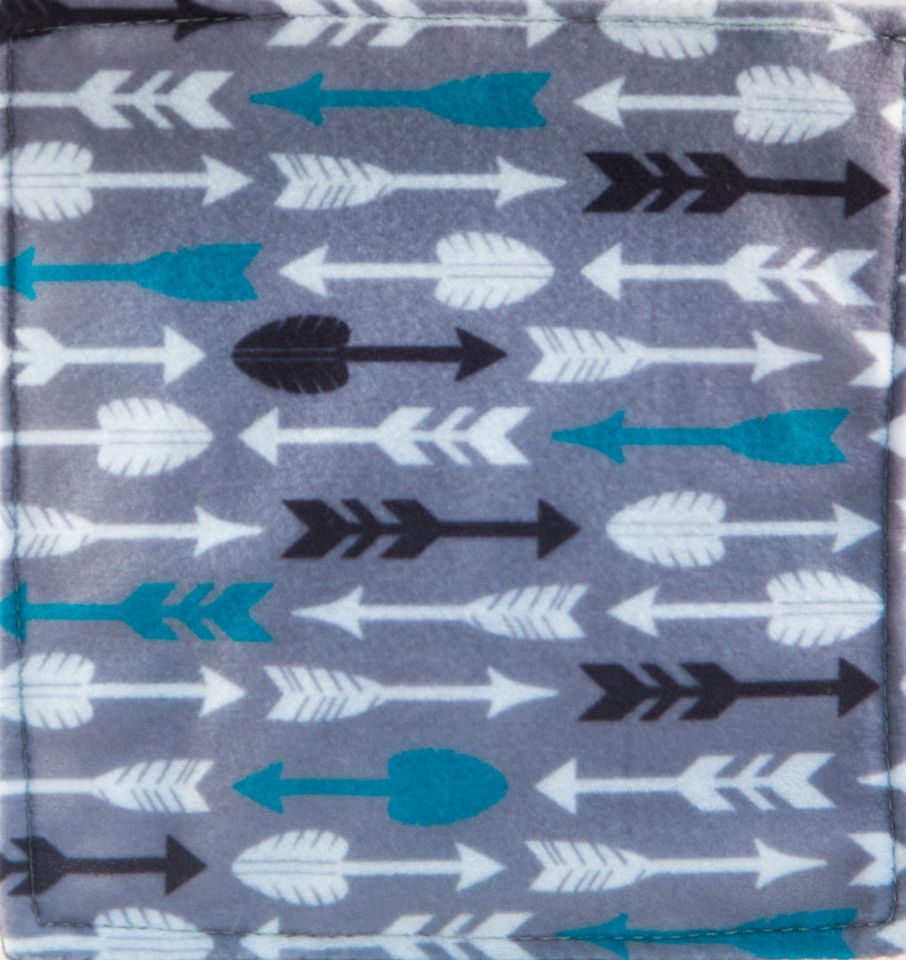 Baby Paper | Arrows shows a soft, washable fabric with blue, black, and white arrow patterns for babies to grasp.
