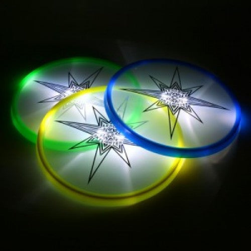 Aerobie Skylighter glowing LED discs in green, yellow, and blue with star design for nighttime throwing fun.