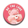 Be the Love Care Bear Button with a smiling pink bear and white text on a vibrant pink background pinback button.