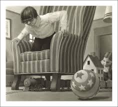 Jumanji product image showing a child playing near a chair with a toy train and ball in a cozy room setting.