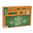 Shut the Box game box with wooden design, dice illustrations, and numbers 2 to 9, for ages 6 and up.