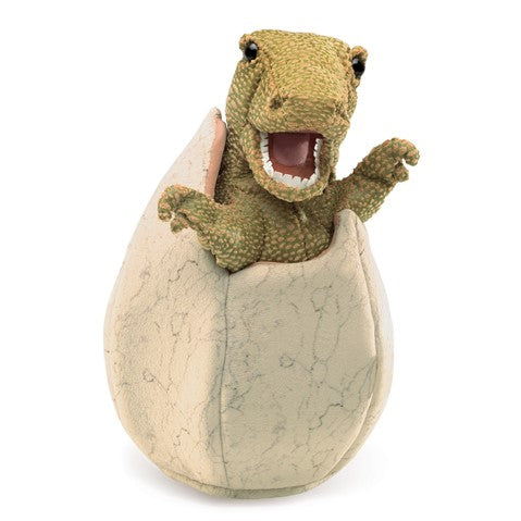 Dino in Egg Puppet T-Rex puppet with movable mouth and arms popping out of a cracked dinosaur egg toy.