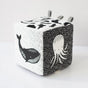 Organic Soft Block | Ocean with black and white whale and octopus illustrations on soft fabric cube.