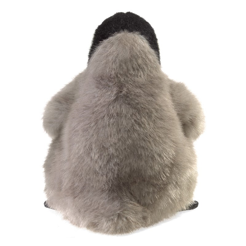 Emperor Penguin Baby Puppet showing soft gray fur and black head, perfect for cuddles and storytelling.