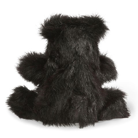 Baby Black Bear Puppet made of soft black fur, designed for kids ages 3 and up, by Folkmanis.