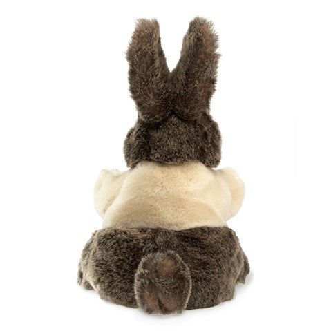 Dutch Rabbit Baby Puppet showing its soft cream and coffee colored fur from the back with tall ears and a fluffy tail.