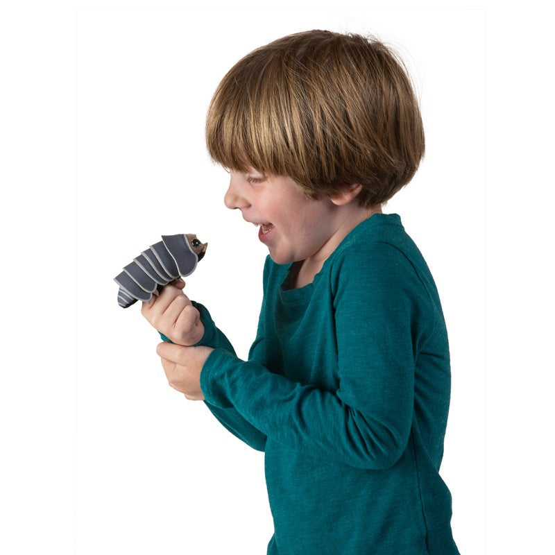 Child playing with a Mini Roly Poly Bug Finger Puppet showing moving exoskeleton plates and big eyes.