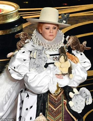 Dutch Rabbit Baby Puppet showing realistic cream and coffee colored bunny with moveable head and paws.