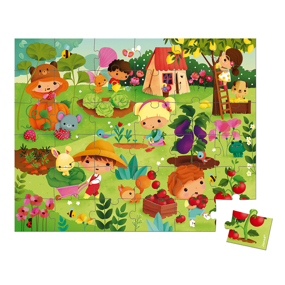 36pc My Garden Suitcase Puzzle showing colorful vegetable garden scene with children and animals playing outdoors.