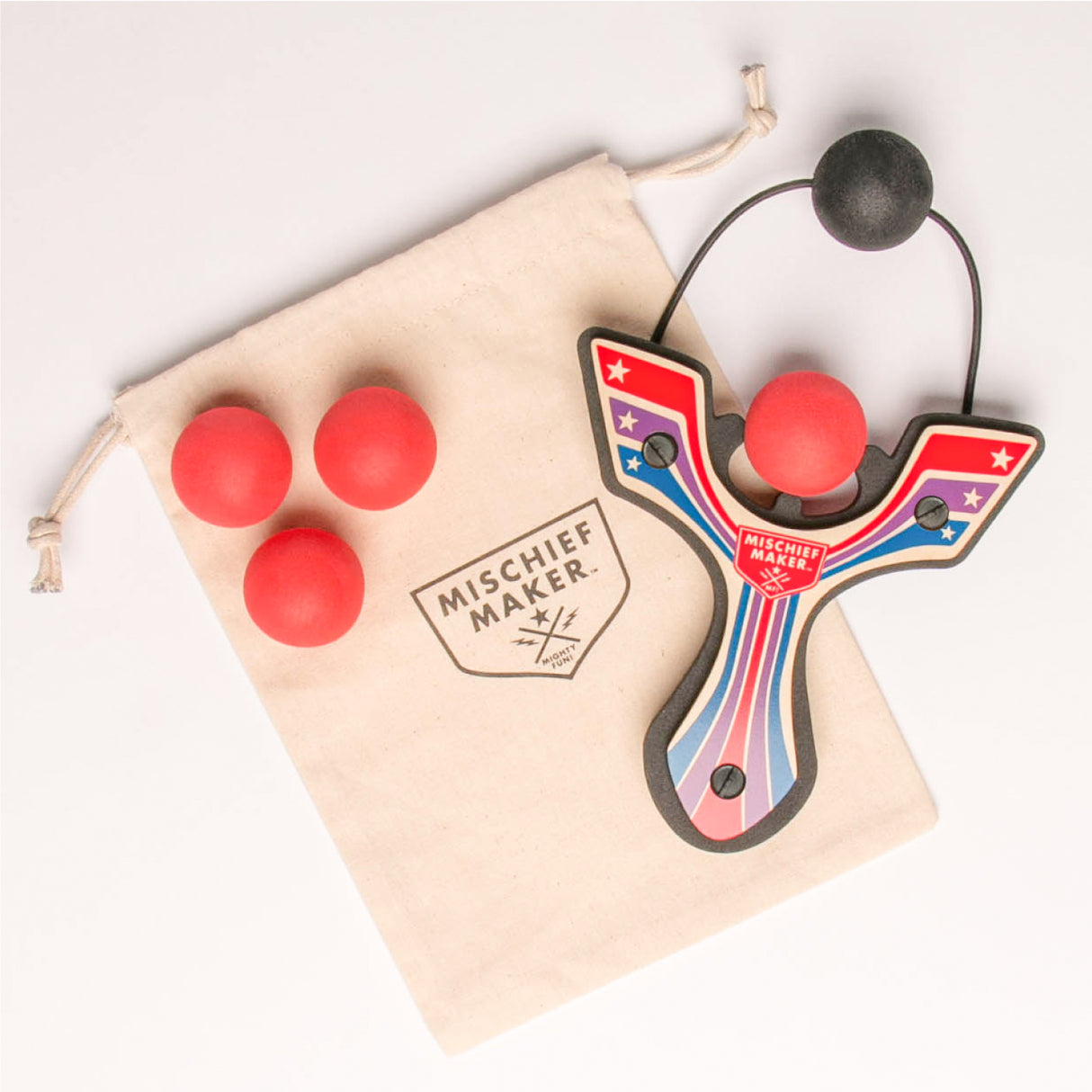 Slingshot Red Winged with red foam balls and storage bag, handmade wooden toy for safe, fun play.