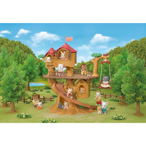 Adventure Treehouse Set with slide, swing, and poseable Outback Koala baby figure in a woodland play environment.