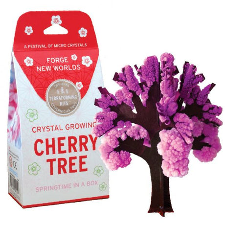Crystal Grow Cherry Tree kit with blooming purple microcrystals and packaging showcasing the product name.