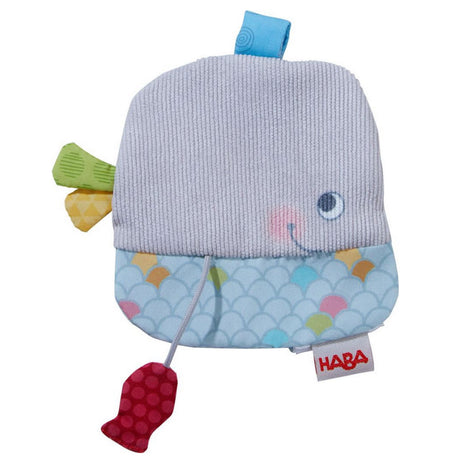 Soft blue and patterned fabric Crinkle Crackle Whale baby comforter with textured fins and a pull string fish toy attached