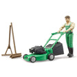 Jeffrey & Lawnmower toy figure with movable parts, lawnmower, rake, and besom for creative gardening play.