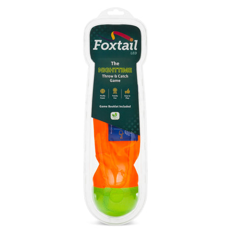 Foxtail LED Softie in packaging with orange nylon tail and green foam ball for nighttime throw and catch game.