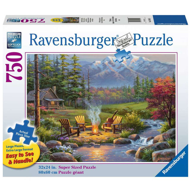 750pc Riverside Livingroom Puzzle featuring a mountain cabin campfire scene with chairs by a riverside.