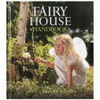 Fairy House Handbook book cover with a child dressed as a fairy building a miniature fairy house outdoors.