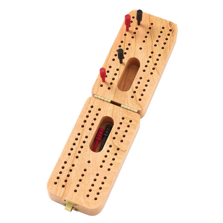 Folding Cribbage board in cherry wood with brass hinges, peg storage, and 60-hole layout for gaming on the go.