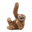 Sloth figurine lying on back with one arm raised, showcasing detailed textured fur and curved claws.