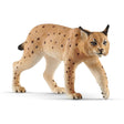 Lynx figurine with distinctive ear tufts and spotted fur, detailed and realistic for children aged 3-8 years.