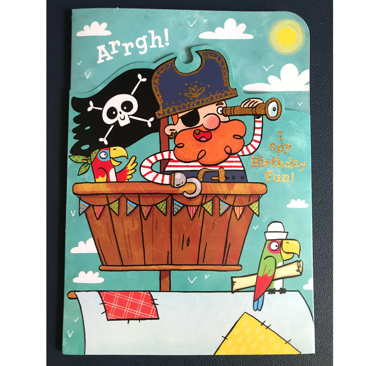 Pirate Birthday Foldout Card with a pirate and parrots aboard a ship, glitter accents, and "I Spy Birthday Fun!" text.