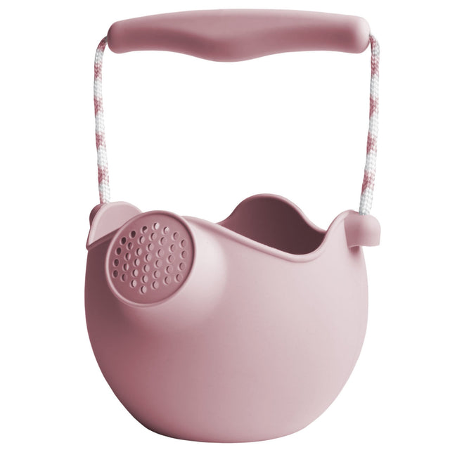 Scrunch Watering Can Dusty Rose made of durable silicone with a flexible handle for easy carrying and pouring.