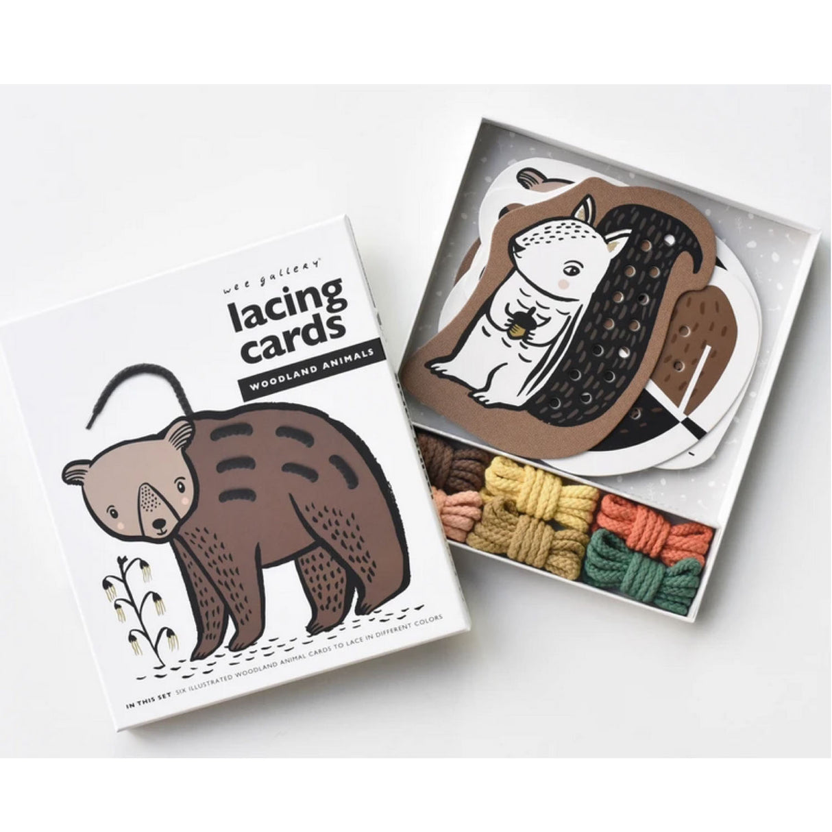 Woodland Lacing Cards with hand illustrated woodland animals and colorful laces for developing motor skills and dexterity.