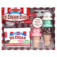 Scoop & Stack Ice Cream Set with 4 magnetic scoops, 2 cones, and scoopers in a red and white striped box.