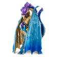 Wizard Dragon figure brooding over a purple crystal ball with blue and gold wings folded as a cloak.