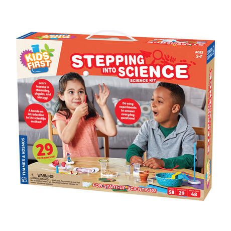 Stepping into Science kit with kids doing hands-on experiments for ages 5-7 exploring chemistry, physics, and biology.