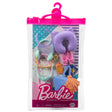 Barbie Fashion Accessories with travel-themed hats, bags, shoes, and neck pillow in a pink hanging case.