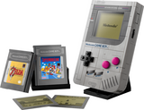Brick-built Super Mario Game Boy with interchangeable game paks and lenticular screens on a display stand