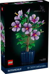 LEGO Botanicals Hibiscus with five large purple blooms and green leaves in a dark blue pot for display