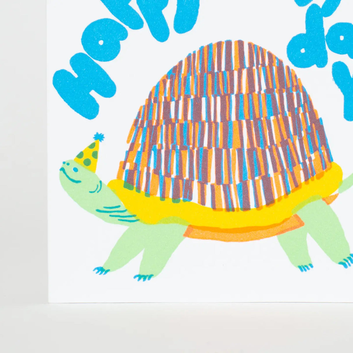Happy Birthday Turtle Card featuring a colorful turtle wearing a party hat, letter-pressed in the USA by Egg Press.