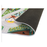 Crossroads Countryside Play Mat showing winding roads, farm scenes, and non-slip backing edge detail for children 2+.