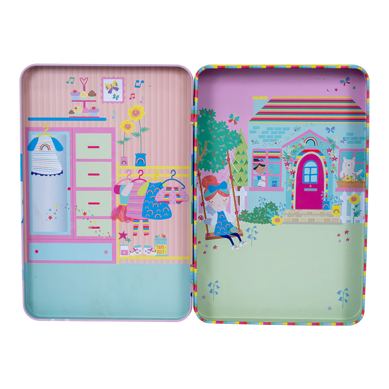 Magnetic Playtime | Rainbow Fairy open tin showing two colorful play scenes with dress-up and outdoor themes.