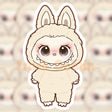 Cute cream-colored Labubu character sticker with big eyes and bunny ears in a 3-inch vinyl design