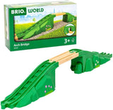 Green toy arch bridge with wooden track piece for train sets, designed for imaginative play and elevated layouts ages 3 and up