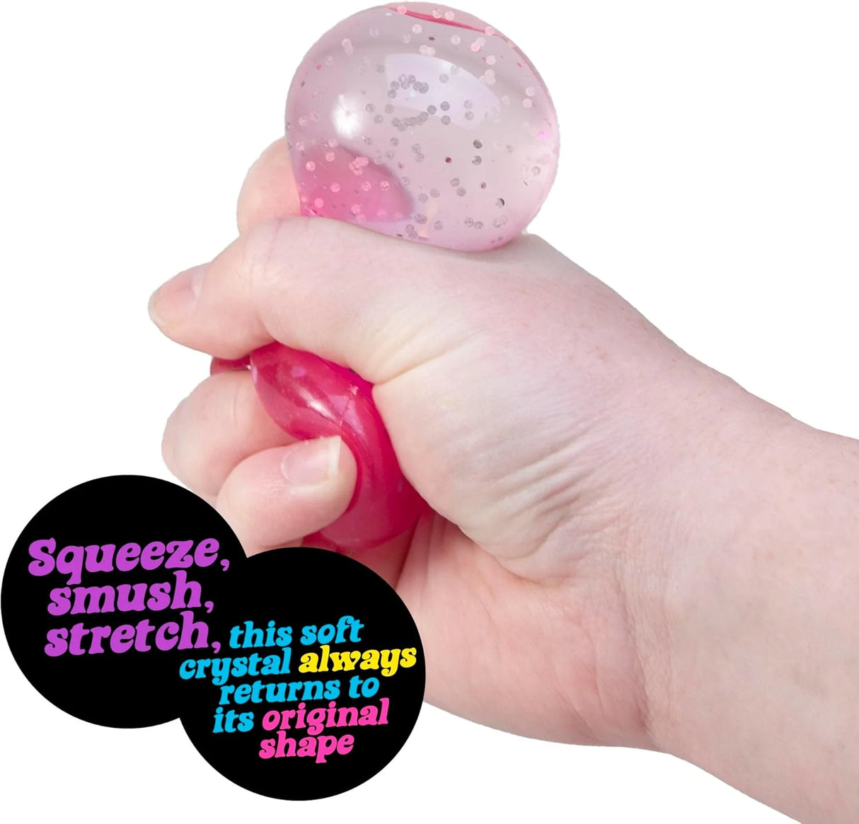 Hand squeezing a pink glittery squishy crystal toy that stretches and bounces back to original shape