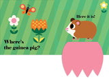 Where's the Cat? Flap Book page with colorful flowers, butterfly, and a guinea pig peeking over a pink flap.