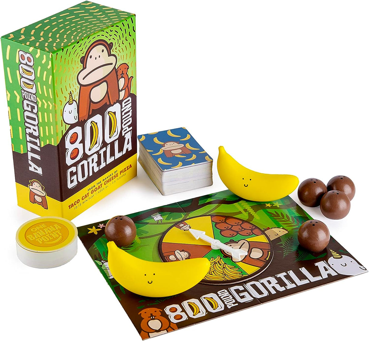 800 Pound Gorilla game with colorful box, game cards, spinner board, bananas, and coconut pieces for players.