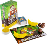 800 Pound Gorilla game with colorful box, game cards, spinner board, bananas, and coconut pieces for players.